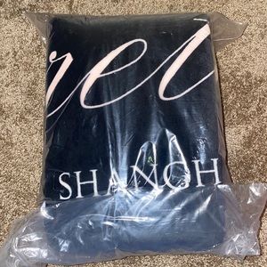 Exclusive Victoria’s Secret sherpa blanket.